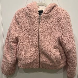 Pink faux fur jacket.
